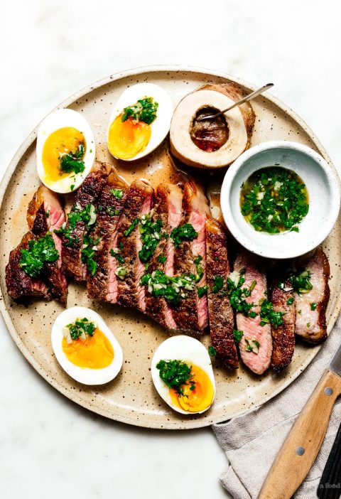 Steak with Japanese chimichurri, roasted bone marrow, and jammy eggs