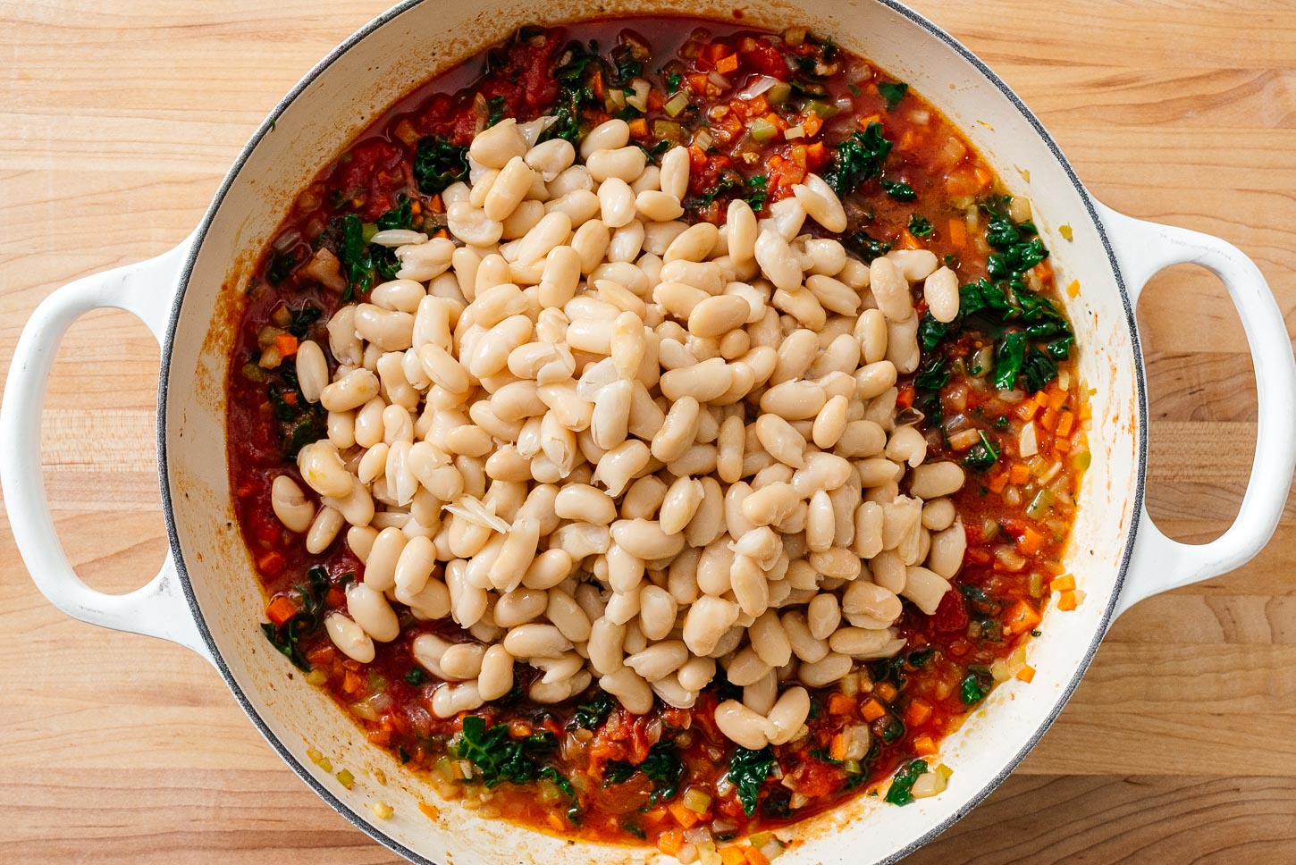 making supreme pizza beans